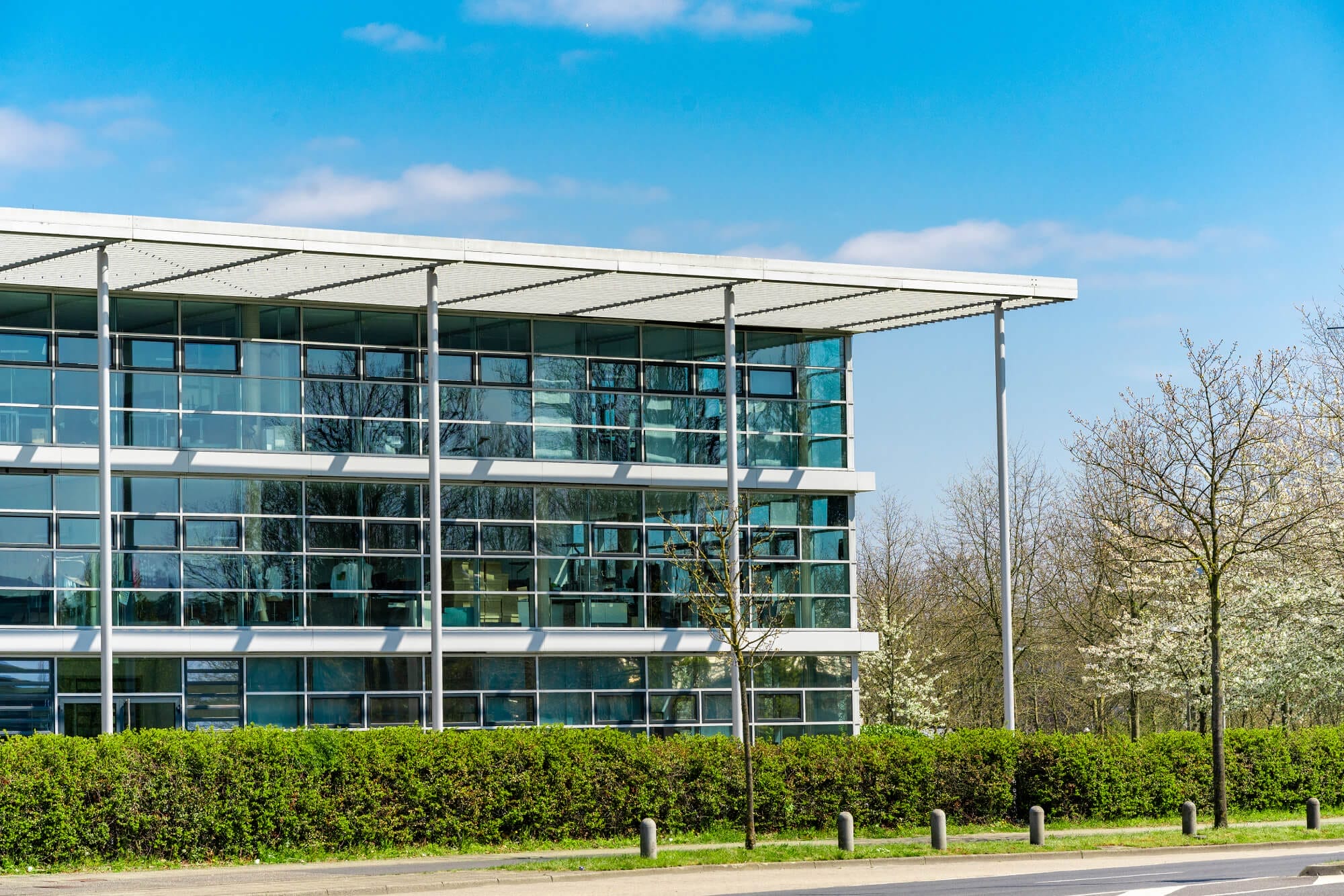 Modern Office Building with Glass Windows for Indoor Air Quality Services
